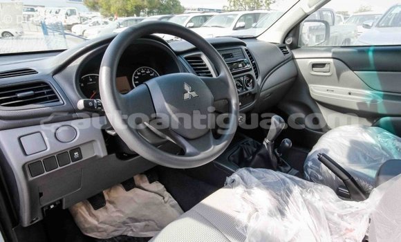 Buy Import Mitsubishi L200 White Car in Import - Dubai in Antigua