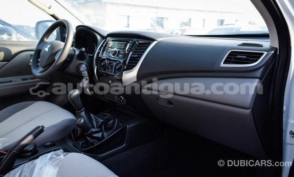Buy Import Mitsubishi L200 White Car in Import - Dubai in Antigua Buy Import Mitsubishi L200 White Car in Import - Dubai in Antigua