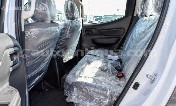 Buy Import Mitsubishi L200 White Car in Import - Dubai in Antigua Buy Import Mitsubishi L200 White Car in Import - Dubai in Antigua