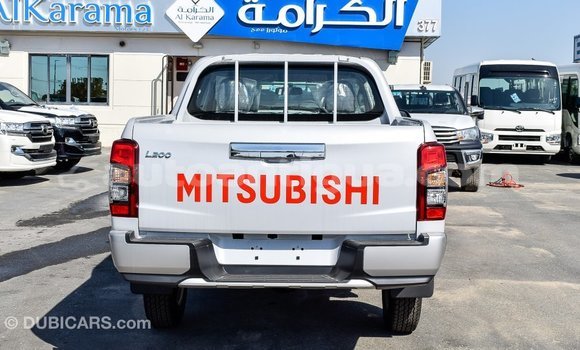 Buy Import Mitsubishi L200 White Car in Import - Dubai in Antigua Buy Import Mitsubishi L200 White Car in Import - Dubai in Antigua