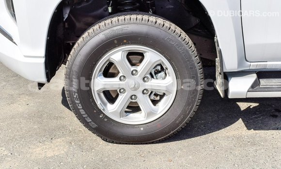 Buy Import Mitsubishi L200 White Car in Import - Dubai in Antigua Buy Import Mitsubishi L200 White Car in Import - Dubai in Antigua