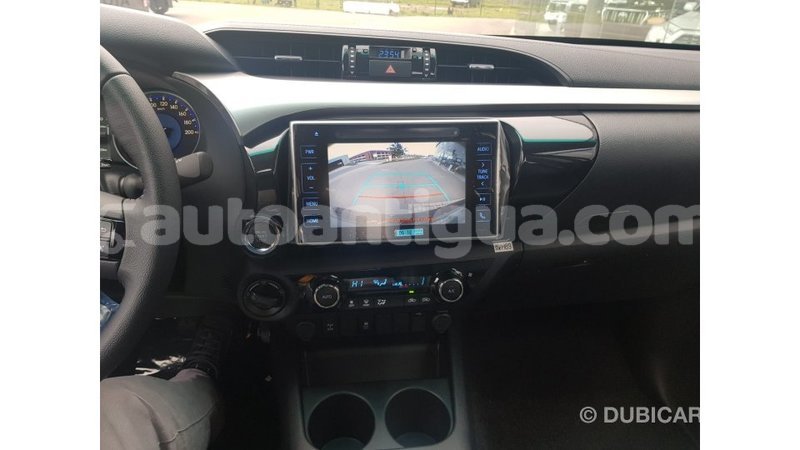 Big with watermark toyota hilux antigua import dubai 1801