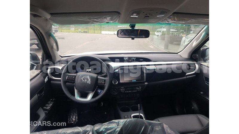 Big with watermark toyota hilux antigua import dubai 1801