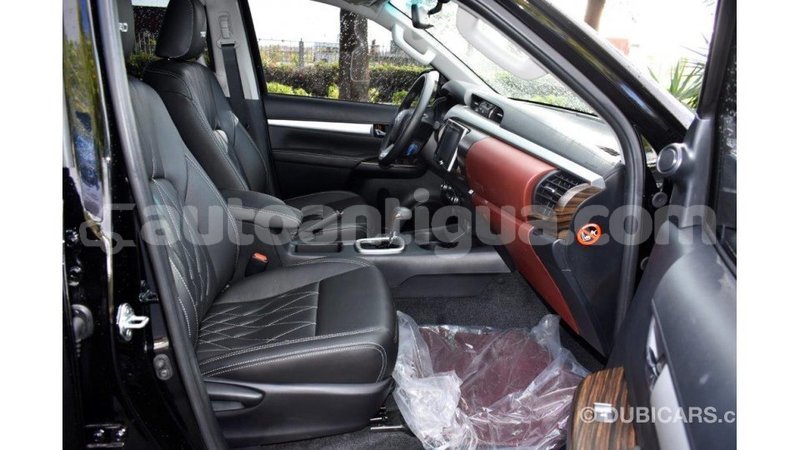 Big with watermark toyota hilux antigua import dubai 1802