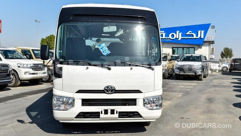 Big with watermark toyota coaster antigua import dubai 1806