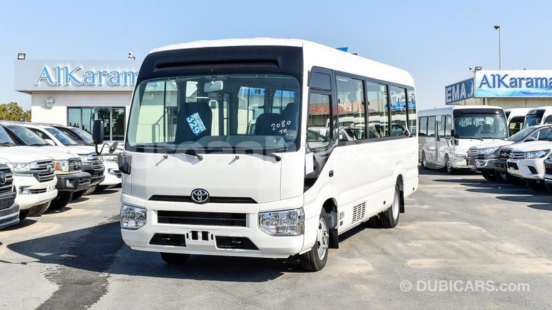 Big with watermark toyota coaster antigua import dubai 1806