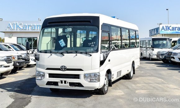 Buy Import Toyota Coaster White Car in Import - Dubai in Antigua Buy Import Toyota Coaster White Car in Import - Dubai in Antigua
