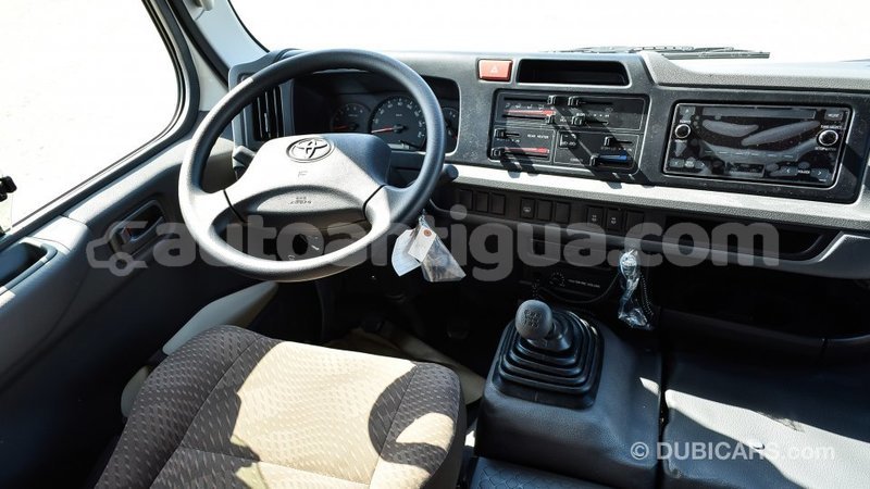 Big with watermark toyota coaster antigua import dubai 1806