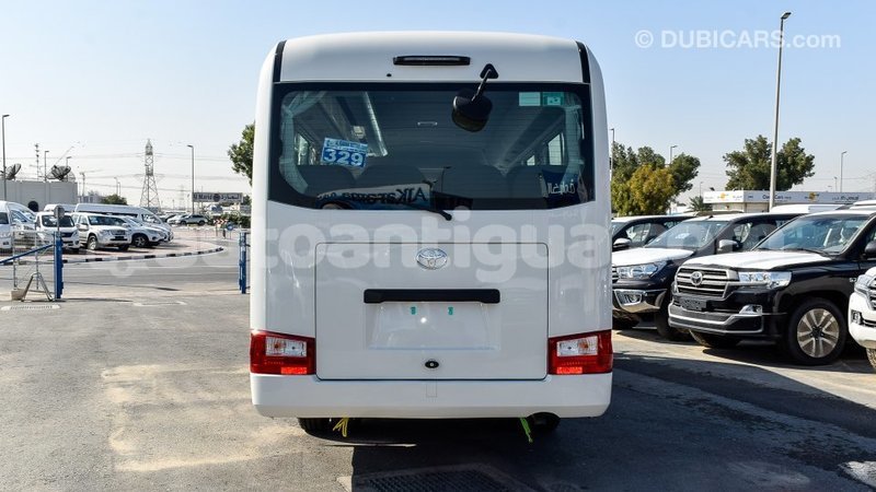 Big with watermark toyota coaster antigua import dubai 1806