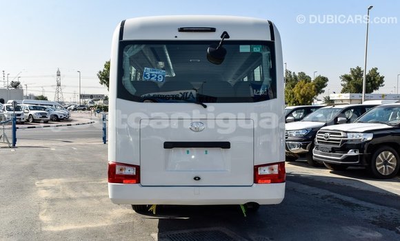 Buy Import Toyota Coaster White Car in Import - Dubai in Antigua Buy Import Toyota Coaster White Car in Import - Dubai in Antigua