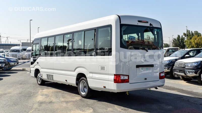 Big with watermark toyota coaster antigua import dubai 1806