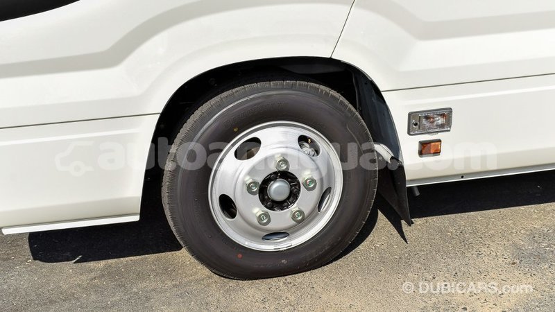 Big with watermark toyota coaster antigua import dubai 1806