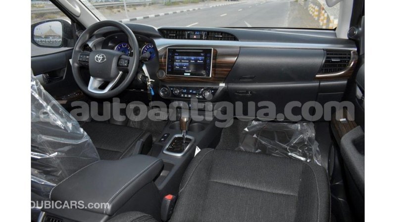 Big with watermark toyota hilux antigua import dubai 1835