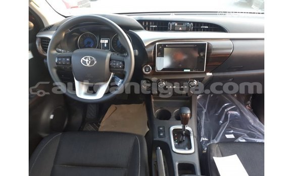 Buy Import Toyota Hilux Red Car in Import - Dubai in Antigua Buy Import Toyota Hilux Red Car in Import - Dubai in Antigua