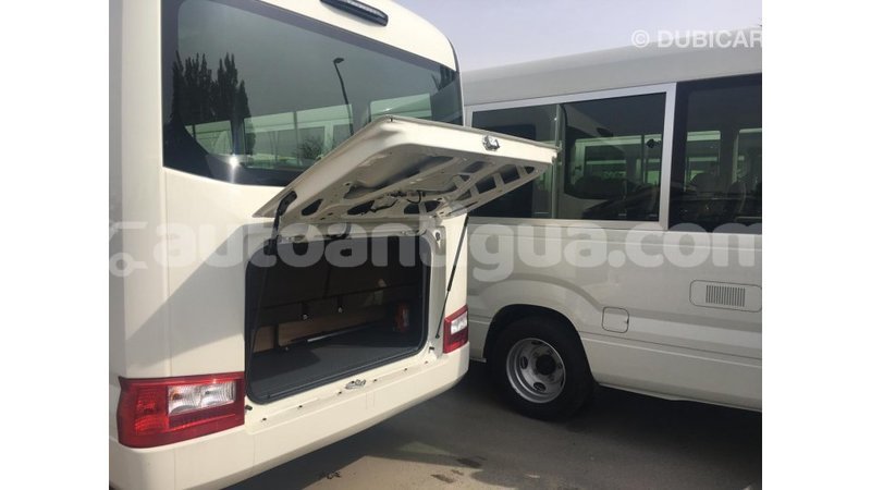 Big with watermark toyota coaster antigua import dubai 1998