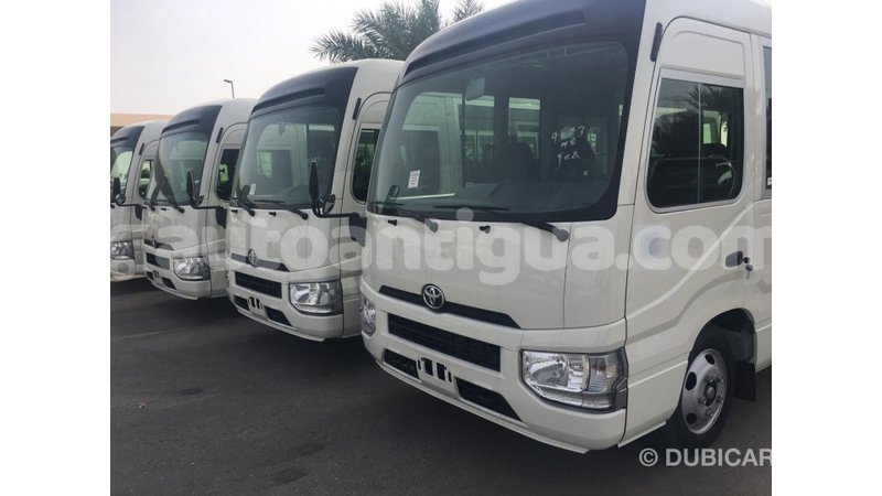 Big with watermark toyota coaster antigua import dubai 1998