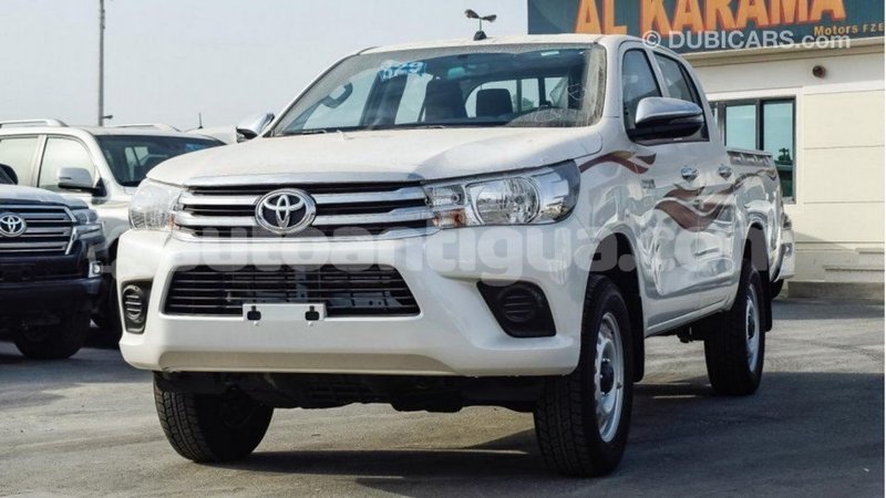 Big with watermark toyota hilux antigua import dubai 2001