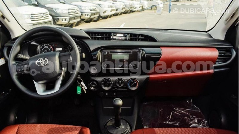 Big with watermark toyota hilux antigua import dubai 2001