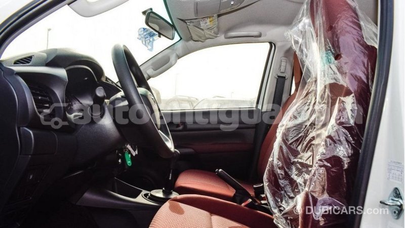 Big with watermark toyota hilux antigua import dubai 2001