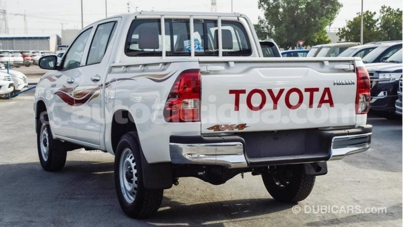 Big with watermark toyota hilux antigua import dubai 2001