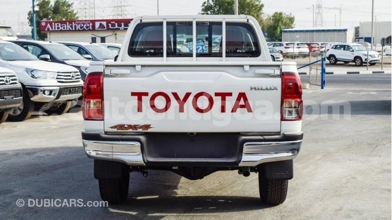 Big with watermark toyota hilux antigua import dubai 2001