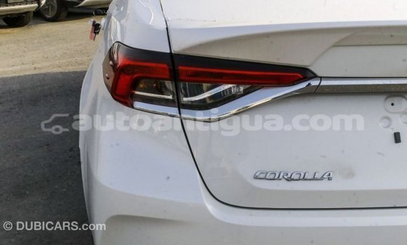 Buy Import Toyota Corolla White Car in Import - Dubai in Antigua Buy Import Toyota Corolla White Car in Import - Dubai in Antigua
