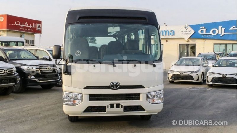 Big with watermark toyota coaster antigua import dubai 2009