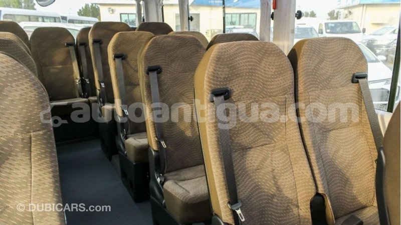 Big with watermark toyota coaster antigua import dubai 2009