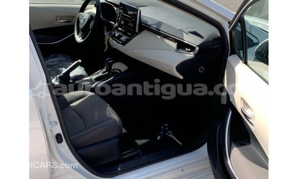 Buy Import Toyota Corolla White Car in Import - Dubai in Antigua Buy Import Toyota Corolla White Car in Import - Dubai in Antigua