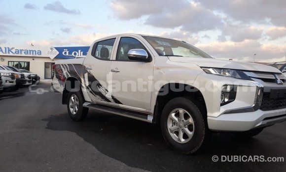 Buy Import Mitsubishi L200 White Car in Import - Dubai in Antigua Buy Import Mitsubishi L200 White Car in Import - Dubai in Antigua