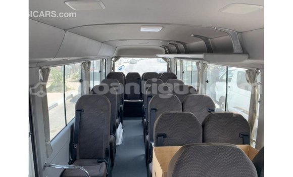 Buy Import Toyota Coaster White Car in Import - Dubai in Antigua Buy Import Toyota Coaster White Car in Import - Dubai in Antigua
