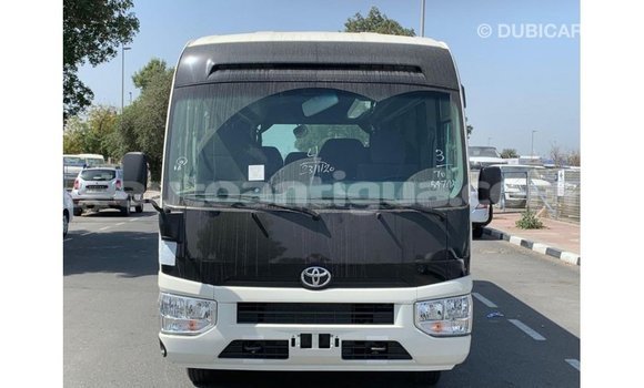 Buy Import Toyota Coaster White Car in Import - Dubai in Antigua Buy Import Toyota Coaster White Car in Import - Dubai in Antigua