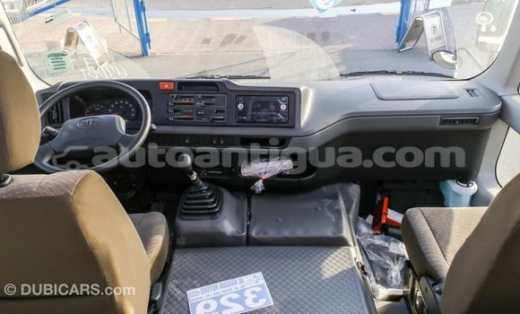 Buy Import Toyota Coaster White Car in Import - Dubai in Antigua Buy Import Toyota Coaster White Car in Import - Dubai in Antigua