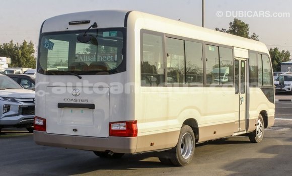 Buy Import Toyota Coaster White Car in Import - Dubai in Antigua Buy Import Toyota Coaster White Car in Import - Dubai in Antigua