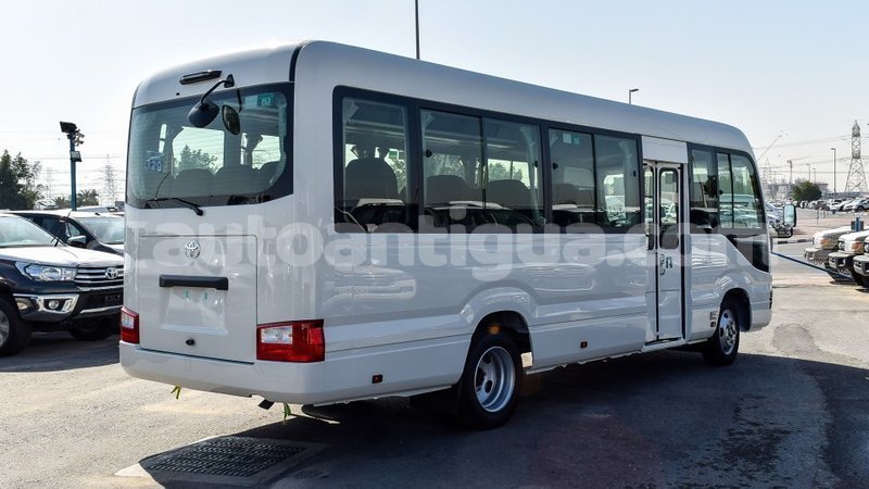 Big with watermark toyota coaster antigua import dubai 2923
