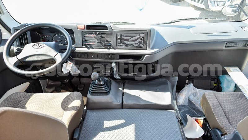 Big with watermark toyota coaster antigua import dubai 2930