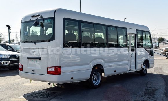 Buy Import Toyota Coaster White Car in Import - Dubai in Antigua Buy Import Toyota Coaster White Car in Import - Dubai in Antigua
