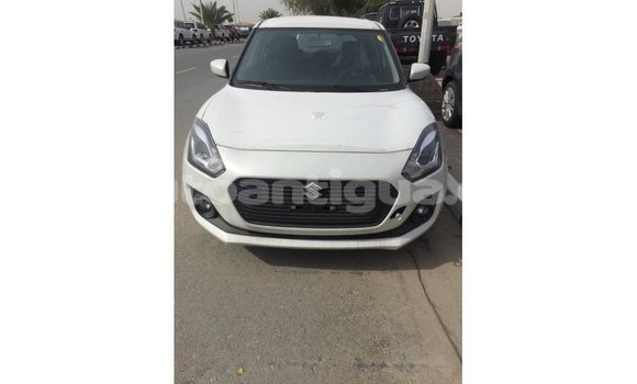 Buy Import Suzuki Swift White Car in Import - Dubai in Antigua