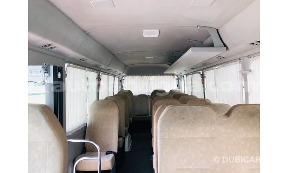 Buy Import Toyota Coaster White Car in Import - Dubai in Antigua Buy Import Toyota Coaster White Car in Import - Dubai in Antigua