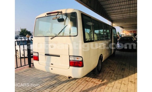 Buy Import Toyota Coaster White Car in Import - Dubai in Antigua Buy Import Toyota Coaster White Car in Import - Dubai in Antigua