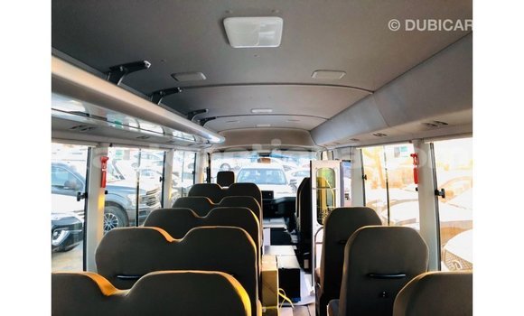 Buy Import Toyota Coaster White Car in Import - Dubai in Antigua Buy Import Toyota Coaster White Car in Import - Dubai in Antigua