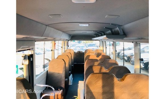 Buy Import Toyota Coaster White Car in Import - Dubai in Antigua Buy Import Toyota Coaster White Car in Import - Dubai in Antigua