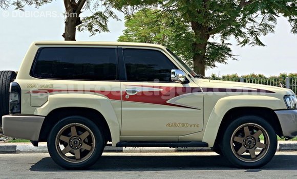 Buy Import Nissan Patrol Beige Car in Import - Dubai in Antigua Buy Import Nissan Patrol Beige Car in Import - Dubai in Antigua