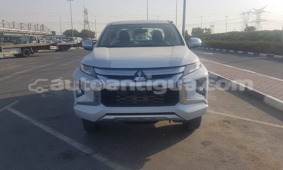 Buy Import Mitsubishi L200 White Car in Import - Dubai in Antigua