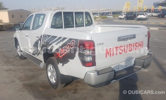 Buy Import Mitsubishi L200 White Car in Import - Dubai in Antigua Buy Import Mitsubishi L200 White Car in Import - Dubai in Antigua