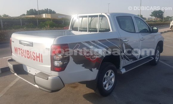 Buy Import Mitsubishi L200 White Car in Import - Dubai in Antigua Buy Import Mitsubishi L200 White Car in Import - Dubai in Antigua