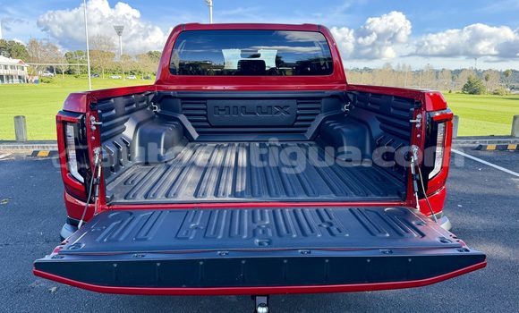 Buy New Toyota Hilux Red Car in St John's in Antigua Buy New Toyota Hilux Red Car in St John's in Antigua