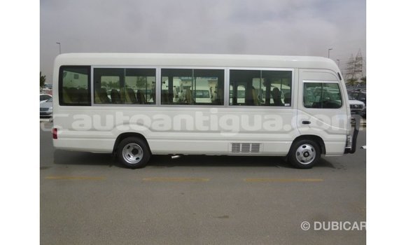 Buy Import Toyota Coaster White Car in Import - Dubai in Antigua Buy Import Toyota Coaster White Car in Import - Dubai in Antigua