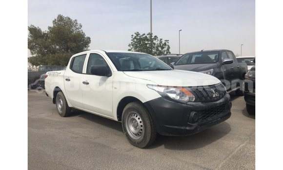 Buy Import Mitsubishi L200 White Car in Import - Dubai in Antigua