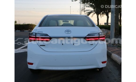 Buy Import Toyota Corolla White Car in Import - Dubai in Antigua Buy Import Toyota Corolla White Car in Import - Dubai in Antigua
